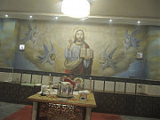 В Коптской церкви Иисус Христос изображен вместе с ангелом, орлом, коровой и львом